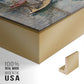 Close-up of the gold floater frame corner and gallery wrapped canvas construction.