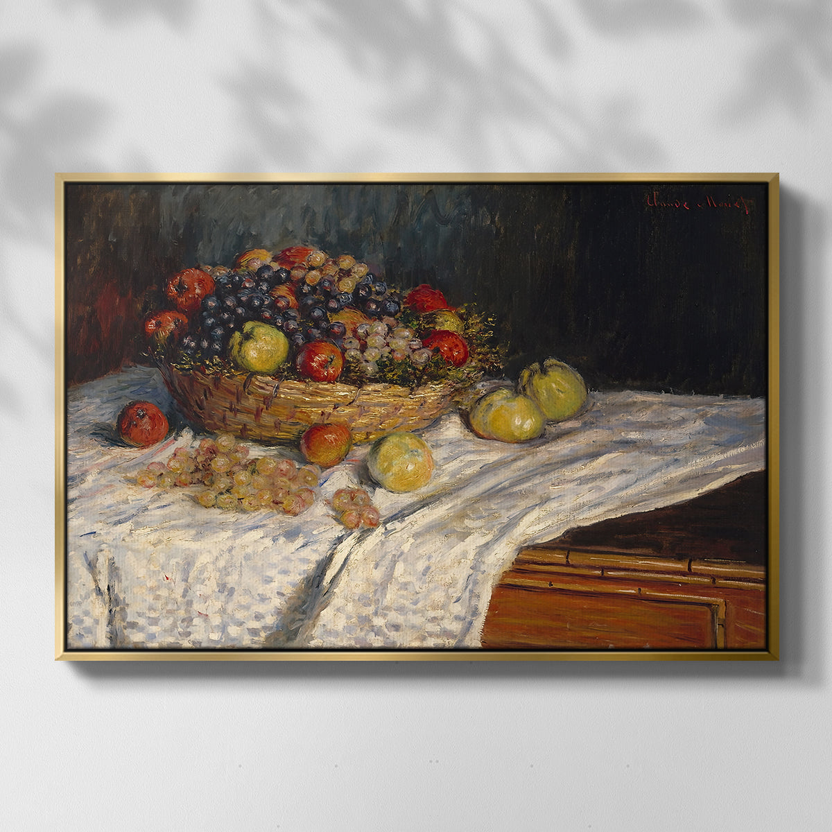 Front view of Still Life with Apples and Grapes, 1880 by Claude Monet in a gold floater framed canvas.