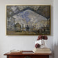 Gold floater framed canvas featuring The Gare Saint-Lazare, 1877 by Claude Monet above an entryway table in a minimalist foyer.