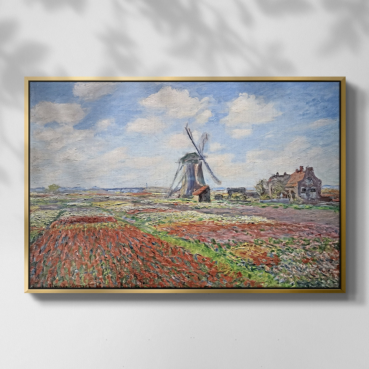 Front view of Tulip Fields with the Rijnsburg Windmill, 1886 by Claude Monet in a gold floater framed canvas.