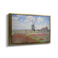 Angled view of Tulip Fields with the Rijnsburg Windmill, 1886 by Claude Monet in a gold floater framed canvas.
