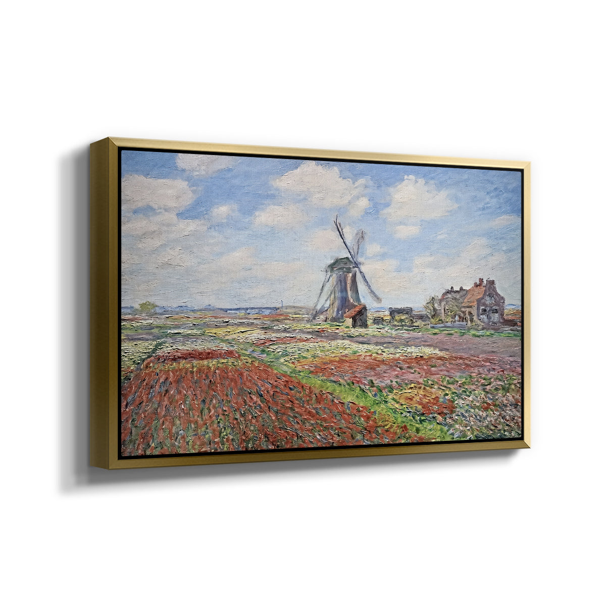 Angled view of Tulip Fields with the Rijnsburg Windmill, 1886 by Claude Monet in a gold floater framed canvas.
