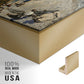 Close-up of the gold floater frame corner and gallery wrapped canvas construction.