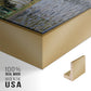 Close-up of the gold floater frame corner and gallery wrapped canvas construction.