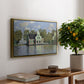 Houses on the Zaan River at Zaandam, 1871 by Claude Monet, presented in a gold floater framed canvas featuring a row of houses along river with reflections in calm water, displayed above a hallway console table.