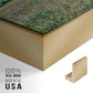 Close-up of the gold floater frame corner and gallery wrapped canvas construction.