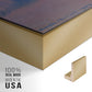Close-up of the gold floater frame corner and gallery wrapped canvas construction.