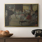 The Dance Class, c. 1873 by Edgar Degas in a gold floater framed canvas displayed above a console table in a hallway, featuring a group of dancers preparing during class with natural light.