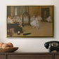 The Dancing Class, c. 1870 by Edgar Degas in a gold floater framed canvas displayed above a console table in a hallway, featuring a group of dancers mid-practice with teacher overseeing.