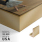Close-up of the gold floater frame corner and gallery wrapped canvas construction.