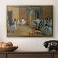 The Dance Foyer at the Opera on the Rue Le Peletier, 1872 by Edgar Degas in a gold floater framed canvas displayed above a console table in a hallway, featuring an elegant rehearsal space with dancers in soft lighting.