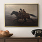 A Ride for Liberty – The Fugitive Slaves, c. 1862 by Eastman Johnson in a gold floater framed canvas displayed above a console table in a hallway, featuring figures on horse moving swiftly through shadowy landscape.