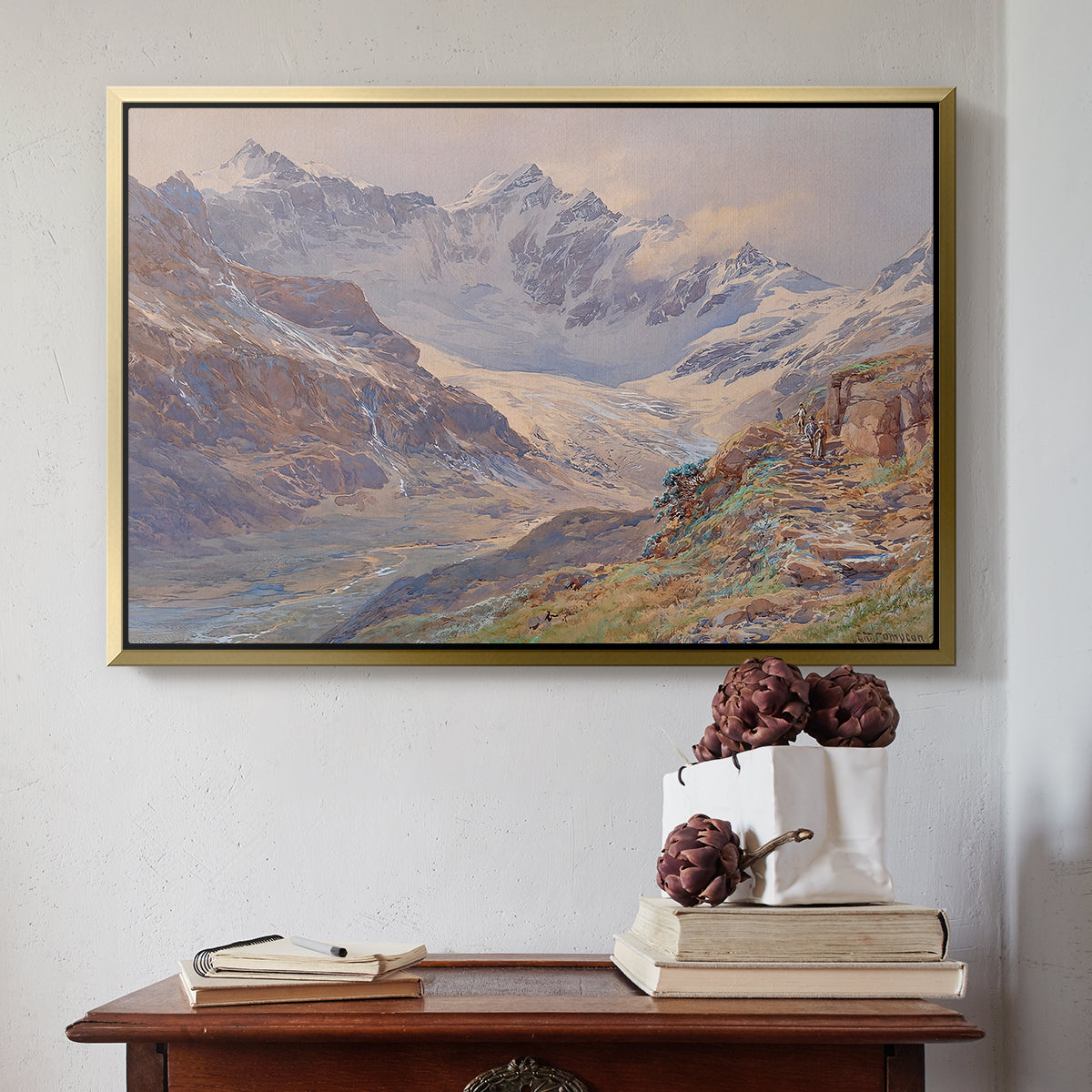 Gold floater framed canvas featuring Odenwinklkees with the Johannisberg, 1902 by Edward Theodore Compton above an entryway table in a minimalist foyer.