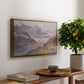 Odenwinklkees with the Johannisberg, 1902 by Edward Theodore Compton, presented in a gold floater framed canvas featuring an alpine glacier landscape with rugged peaks and snow-covered terrain, displayed above a hallway console table.
