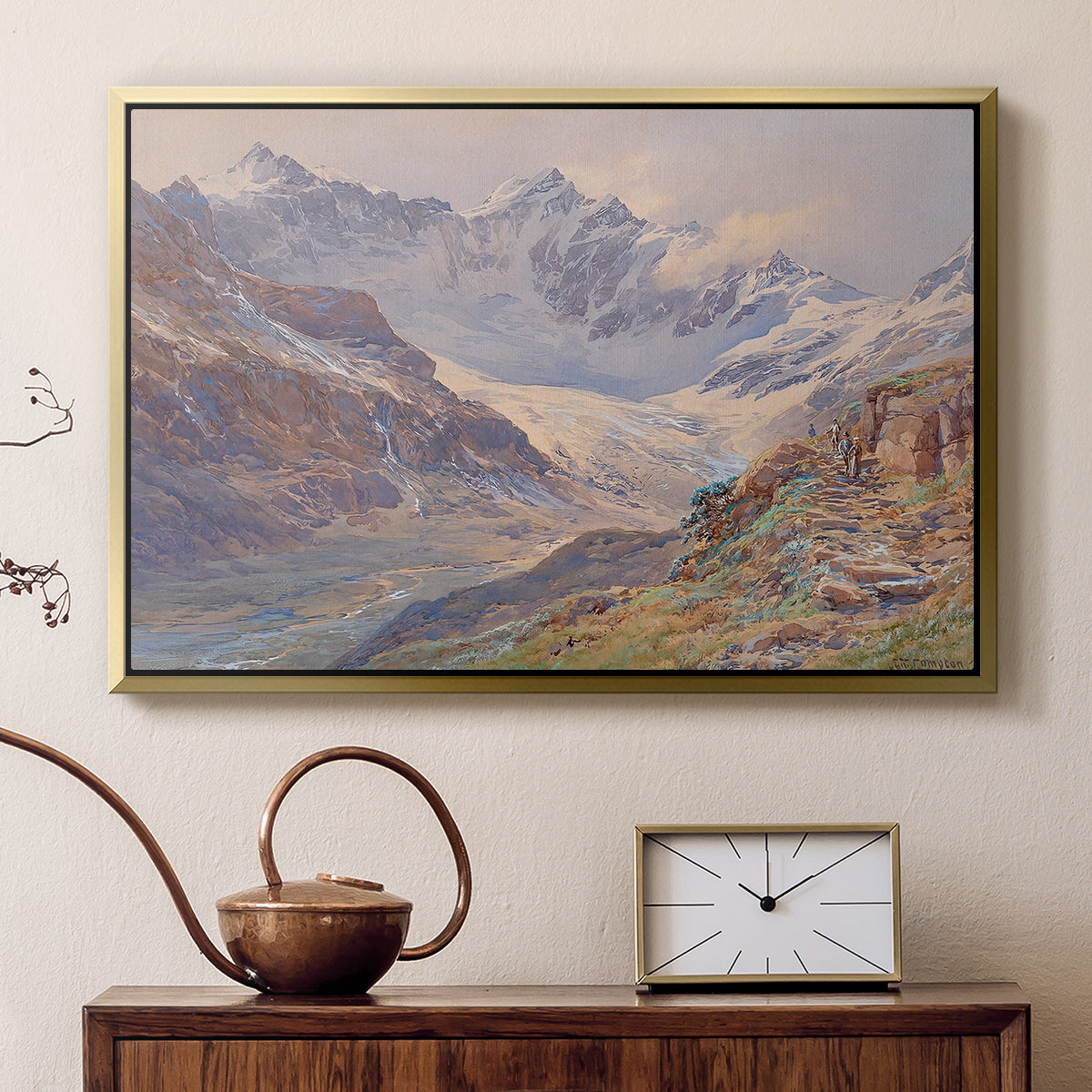 Gold floater framed canvas featuring a realistic depiction of high-altitude snowy peaks, displayed above a cabinet in a soft-toned living room.