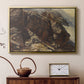Gold floater framed canvas featuring a high-altitude scene with rocky formations and sparse vegetation, displayed above a cabinet in a soft-toned living room.