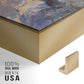 Close-up of the gold floater frame corner and gallery wrapped canvas construction.