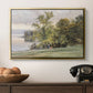 Landscape at Lake Starnberg, 1890 by Edward Theodore Compton in a gold floater framed canvas displayed above a console table in a hallway, featuring a tranquil lakeside view with soft atmospheric tones.