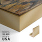 Close-up of the gold floater frame corner and gallery wrapped canvas construction.