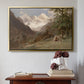 Gold floater framed canvas featuring Landscape in the Caucasus, c. 1921 by Edward Theodore Compton above an entryway table in a minimalist foyer.