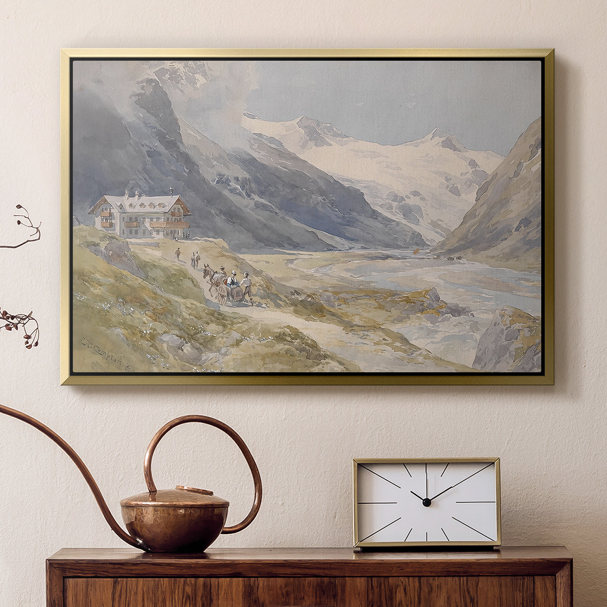 Gold floater framed canvas featuring a rural alpine setting with shepherds and open terrain, displayed above a cabinet in a soft-toned living room.