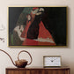 Gold floater framed canvas featuring an expressive painting of figures entwined with bold lines and color, displayed above a cabinet in a soft-toned living room.