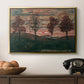 Four Trees, 1917 by Egon Schiele in a gold floater framed canvas displayed above a console table in a hallway, featuring an expressionist landscape featuring isolated trees in field.