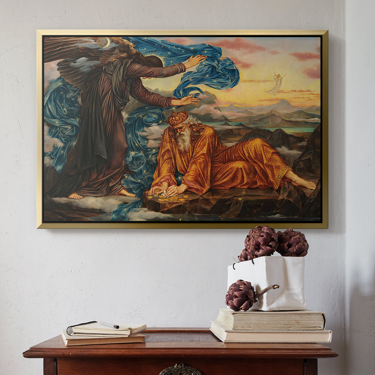 Gold floater framed canvas featuring Earthbound, 1897 by Evelyn De Morgan above an entryway table in a minimalist foyer.
