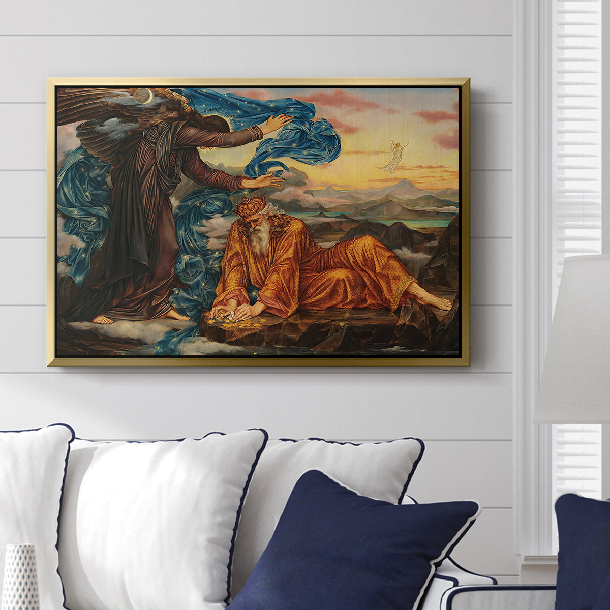 Earthbound, 1897 by Evelyn De Morgan displayed above a sofa in a living room in a gold floater frame, featuring an allegorical scene with woman resting amid flowing drapery and landscape.