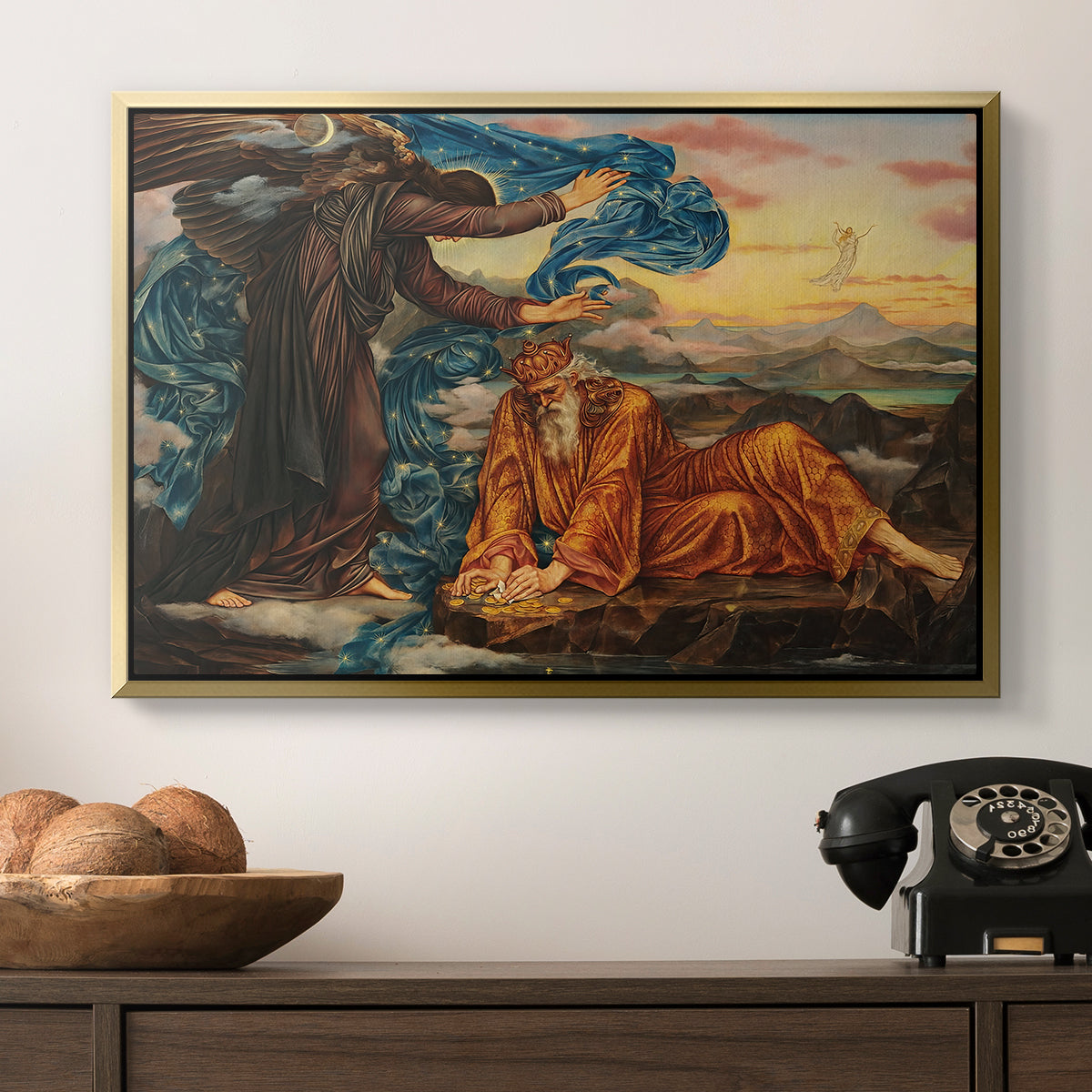 Earthbound, 1897 by Evelyn De Morgan in a gold floater framed canvas displayed above a console table in a hallway, featuring a classical-style figure lying in ornate, mystical environment.