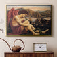 Gold floater framed canvas featuring a religious scene with angel defeating snake in dramatic pose, displayed above a cabinet in a soft-toned living room.