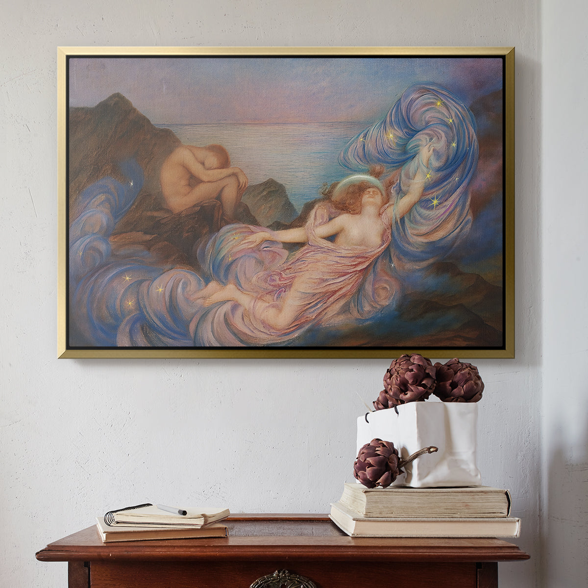 Gold floater framed canvas featuring Twilight, 1914 by Evelyn De Morgan above an entryway table in a minimalist foyer.
