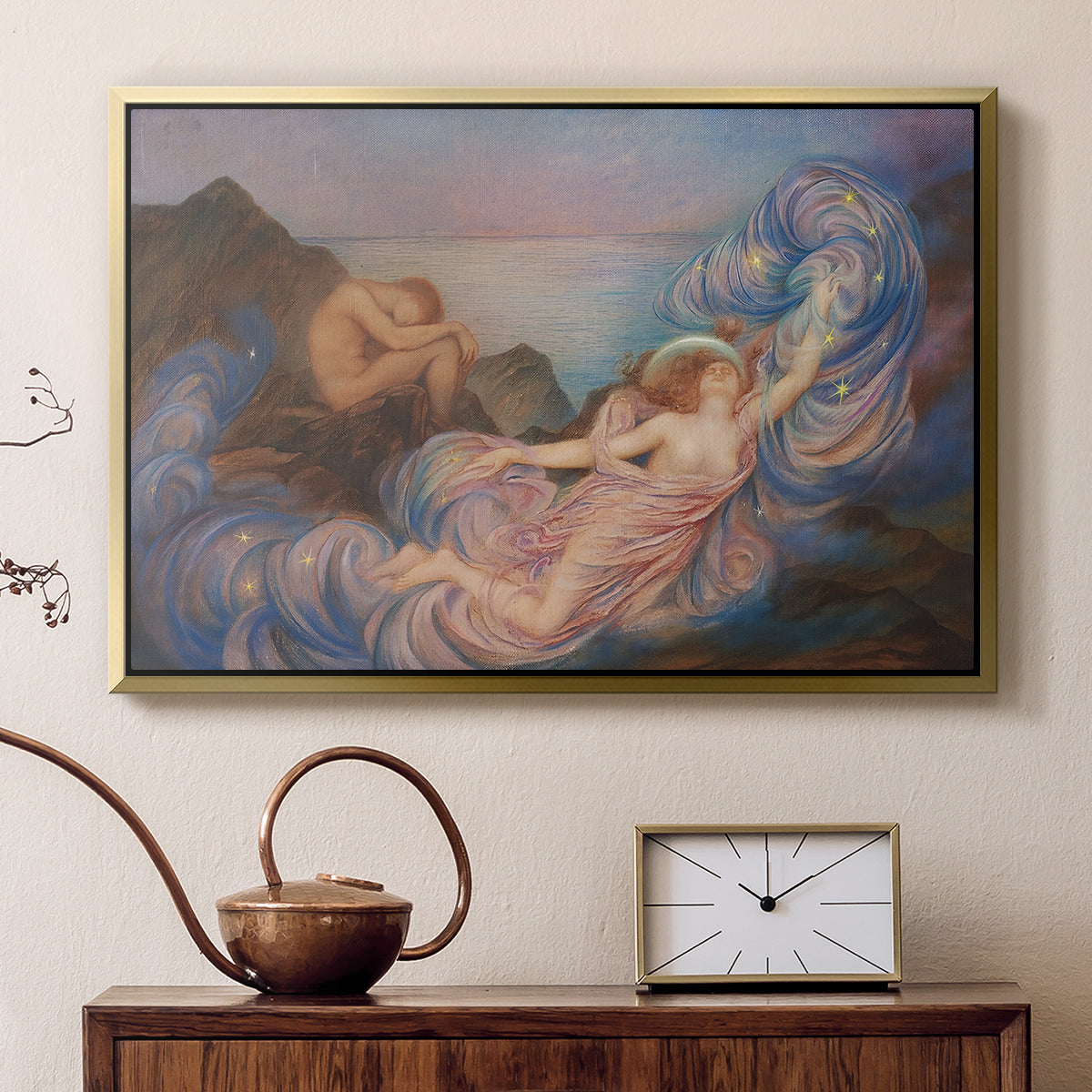 Gold floater framed canvas featuring a dreamlike composition with woman in fading light, displayed above a cabinet in a soft-toned living room.