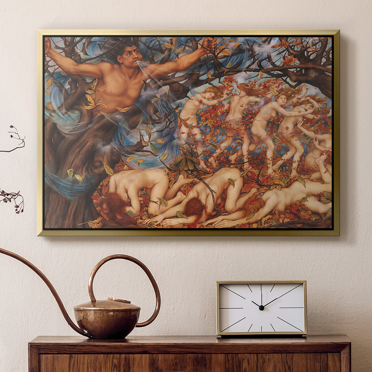 Gold floater framed canvas featuring an energetic depiction of figures swept through air by wind, displayed above a cabinet in a soft-toned living room.