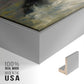Close-up of the silver floater frame corner and gallery wrapped canvas construction.