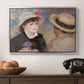 Boating Couple (Aline Charigot and Renoir), c. 1881 by Pierre-Auguste Renoir in a silver floater framed canvas displayed above a console table in a hallway, featuring a romantic scene of two figures in casual conversation with soft light.