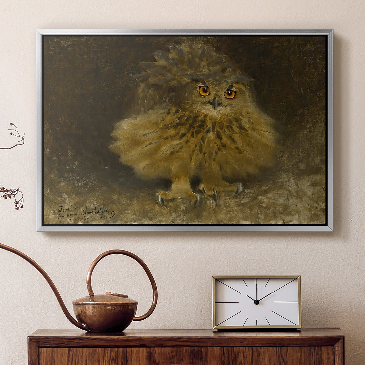 Silver floater framed canvas featuring a bird of prey resting on tree branch with textured feathers, displayed above a cabinet in a soft-toned living room.
