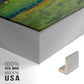 Close-up of the silver floater frame corner and gallery wrapped canvas construction.