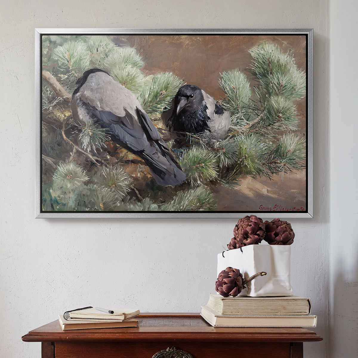 Silver floater framed canvas featuring Hooded Crows (Kråkor), 1891 by Bruno Liljefors above an entryway table in a minimalist foyer.