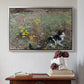 Silver floater framed canvas featuring Cat on a Flowery Meadow, 1887 by Bruno Liljefors above an entryway table in a minimalist foyer.