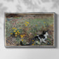 Front view of Cat on a Flowery Meadow, 1887 by Bruno Liljefors in a silver floater framed canvas.