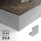 Close-up of the silver floater frame corner and gallery wrapped canvas construction.