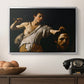 David with the Head of Goliath (Vienna Version), c. 1607 by Caravaggio in a silver floater framed canvas displayed above a console table in a hallway, featuring an intense religious scene with figure emerging from darkness holding trophy.