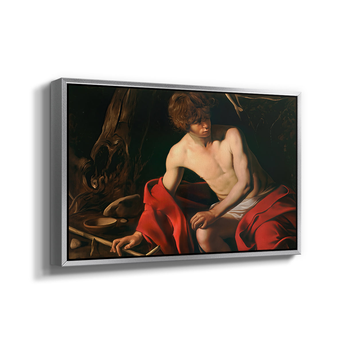Angled view of Saint John the Baptist in the Wilderness, c. 1603-1604 by Caravaggio in a silver floater framed canvas.