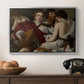 The Musicians, c. 1595 by Caravaggio in a silver floater framed canvas displayed above a console table in a hallway, featuring a musical gathering with figures posed closely in soft light.