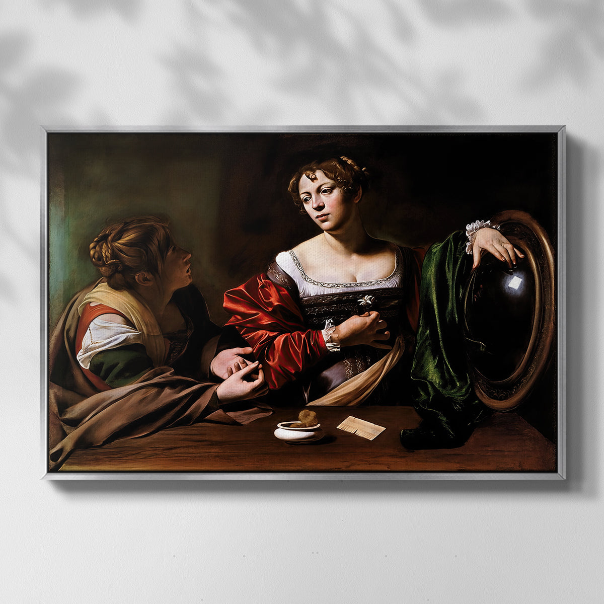 Front view of Martha and Mary Magdalene, c. 1598 by Caravaggio in a silver floater framed canvas.