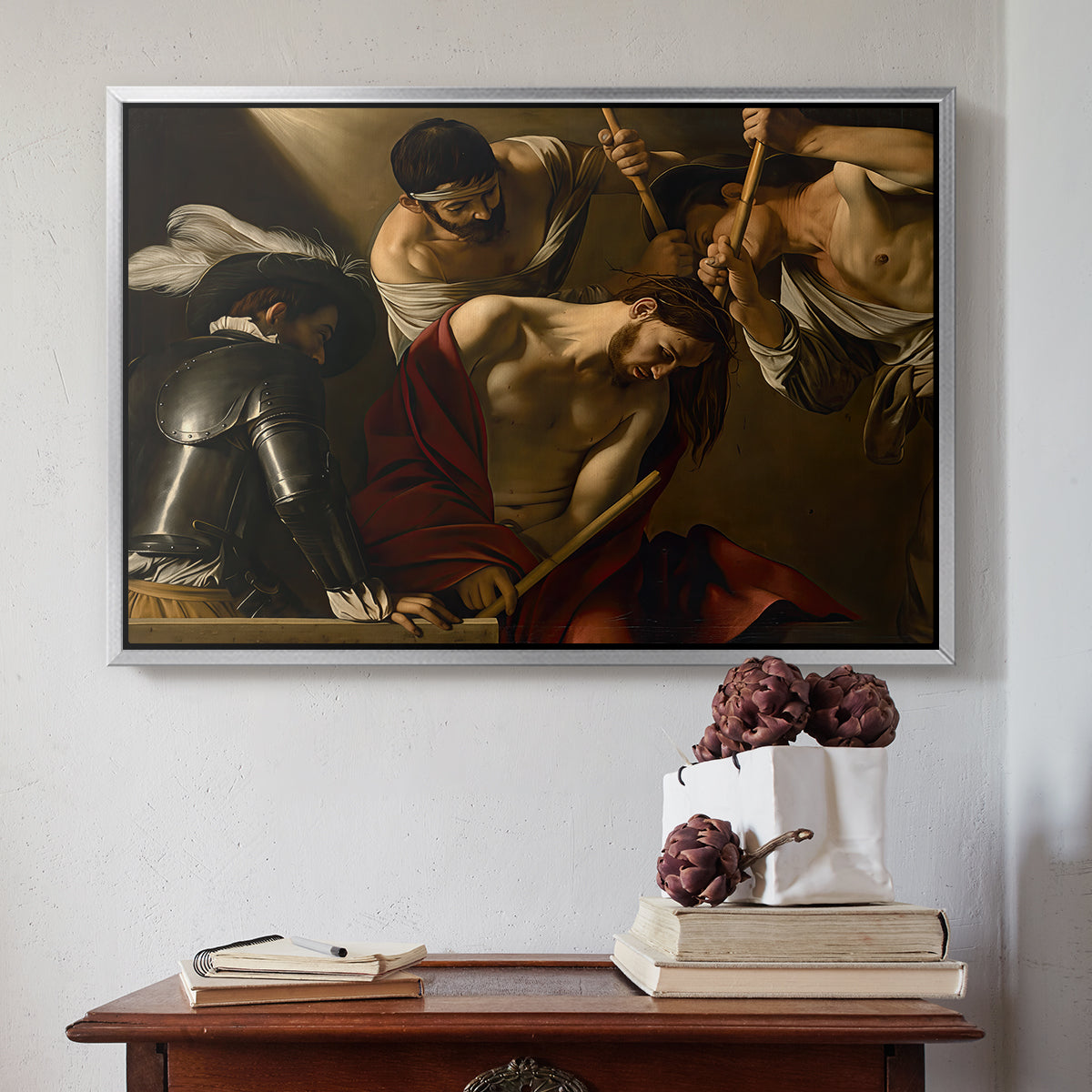 Silver floater framed canvas featuring The Crowning with Thorns (Vienna Version), c. 1602-1604 by Caravaggio above an entryway table in a minimalist foyer.