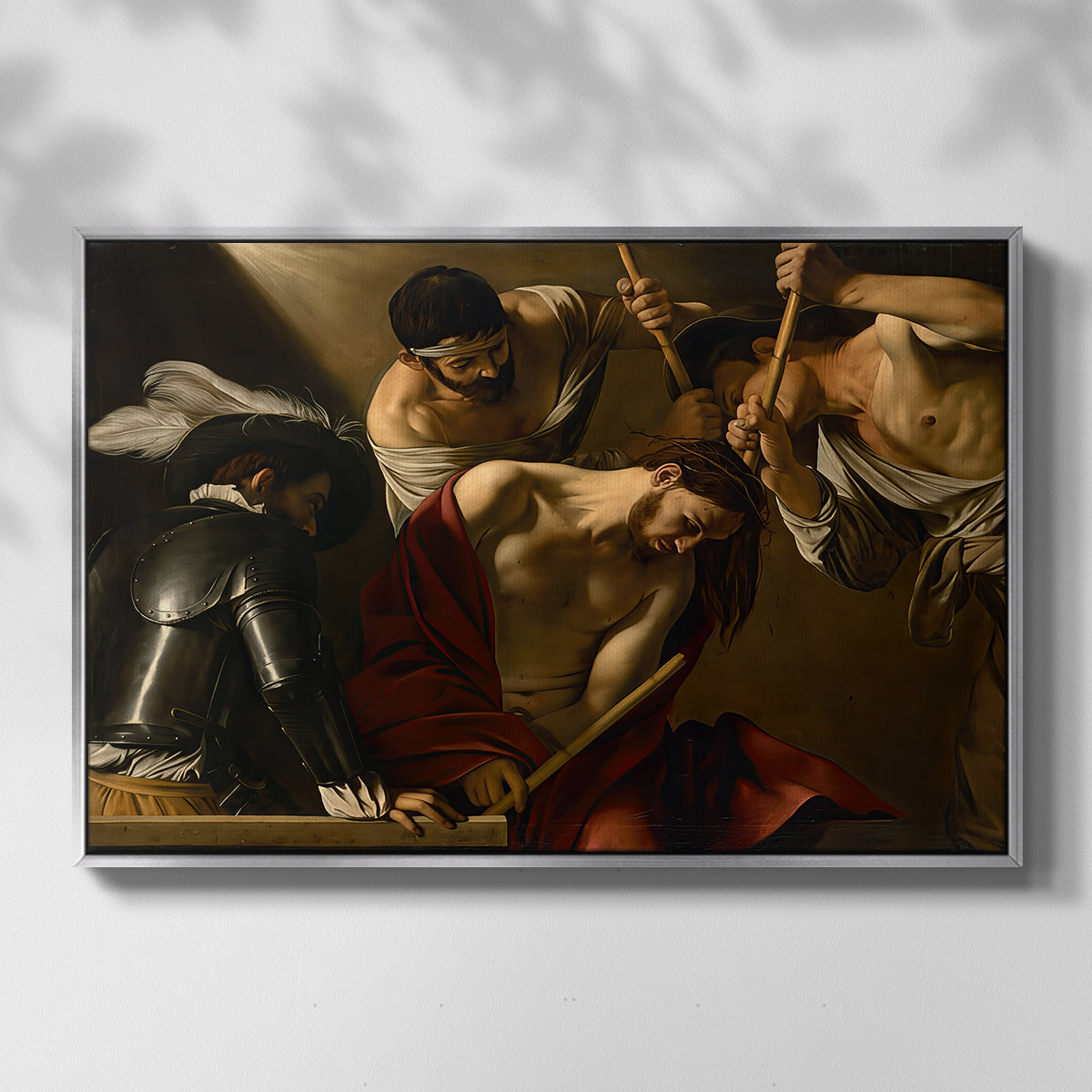 Front view of The Crowning with Thorns (Vienna Version), c. 1602-1604 by Caravaggio in a silver floater framed canvas.