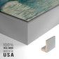 Close-up of the silver floater frame corner and gallery wrapped canvas construction.
