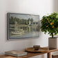 The Bridge at Argenteuil, 1874 by Claude Monet, presented in a silver floater framed canvas featuring a bridge spanning river with sailboats and reflections in water, displayed above a hallway console table.